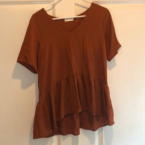 Péplum burnt orange top